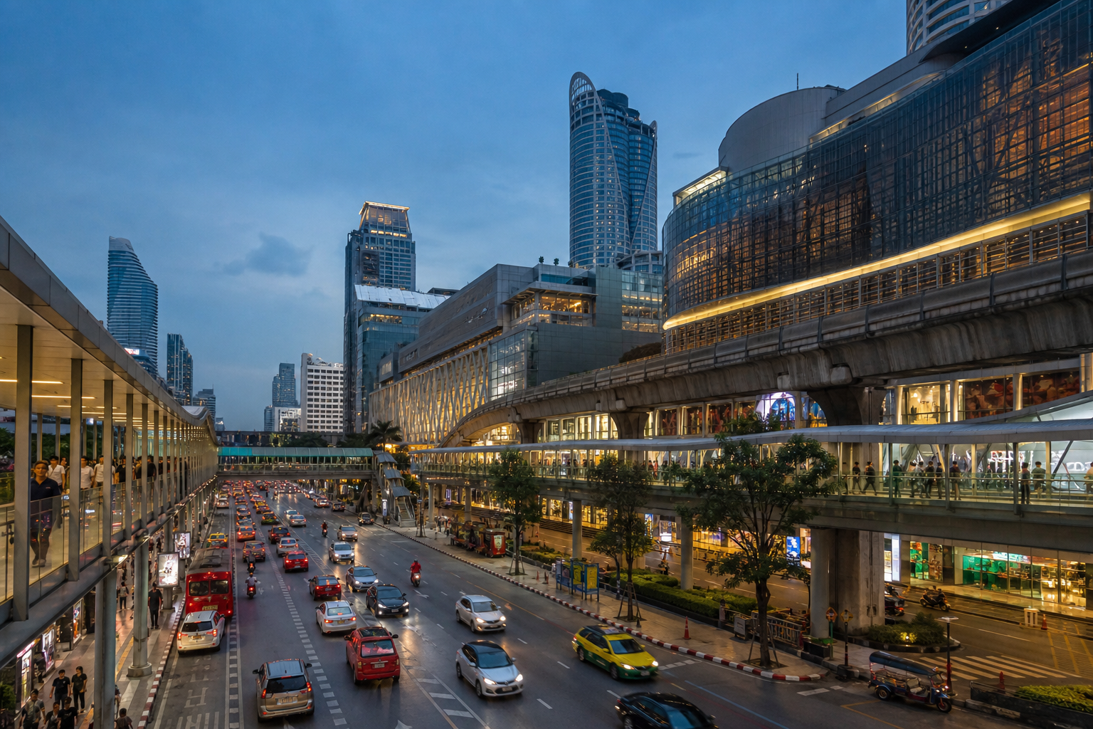 Chidlom and Ratchaprasong skywalks, rail infrastructure, towers, and traffic at dusk