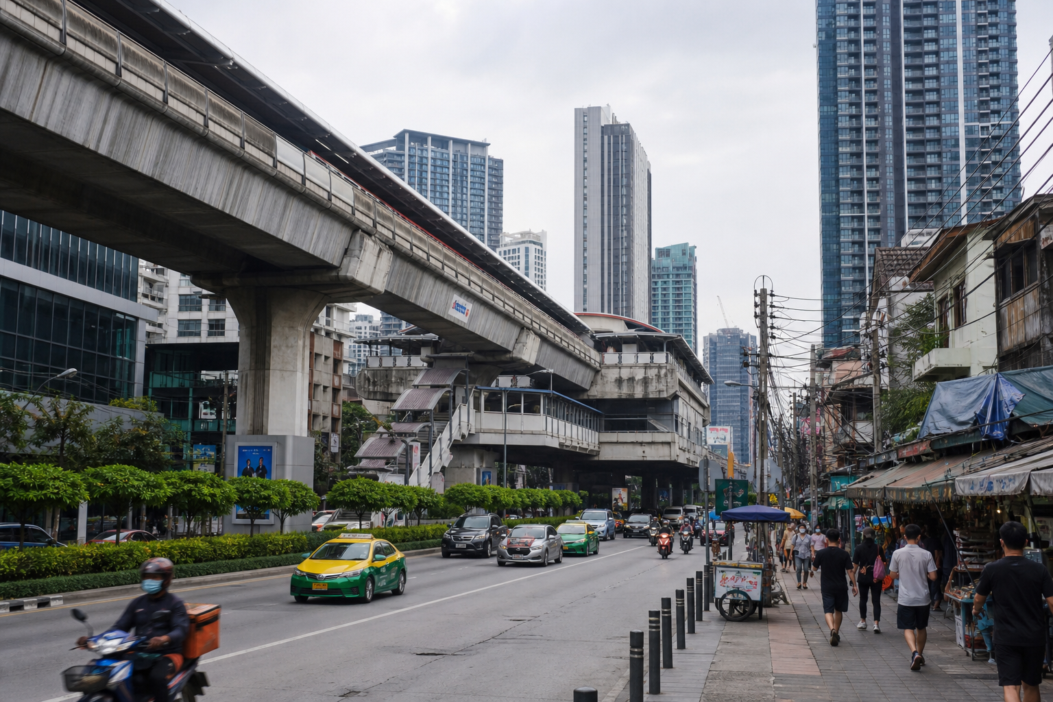On Nut BTS, condominiums, older shops, traffic, motorcycles, and pedestrians