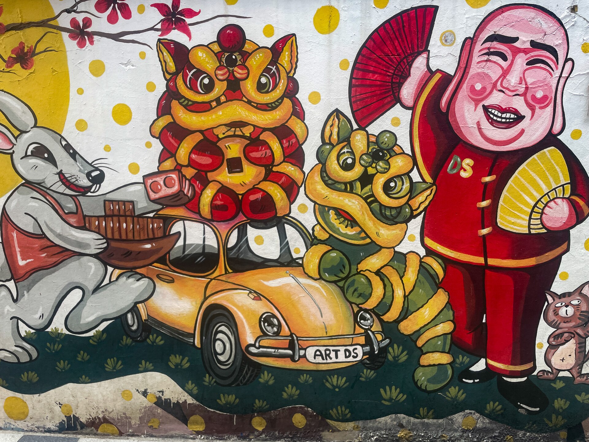 Street art and a narrow lane in Talat Noi