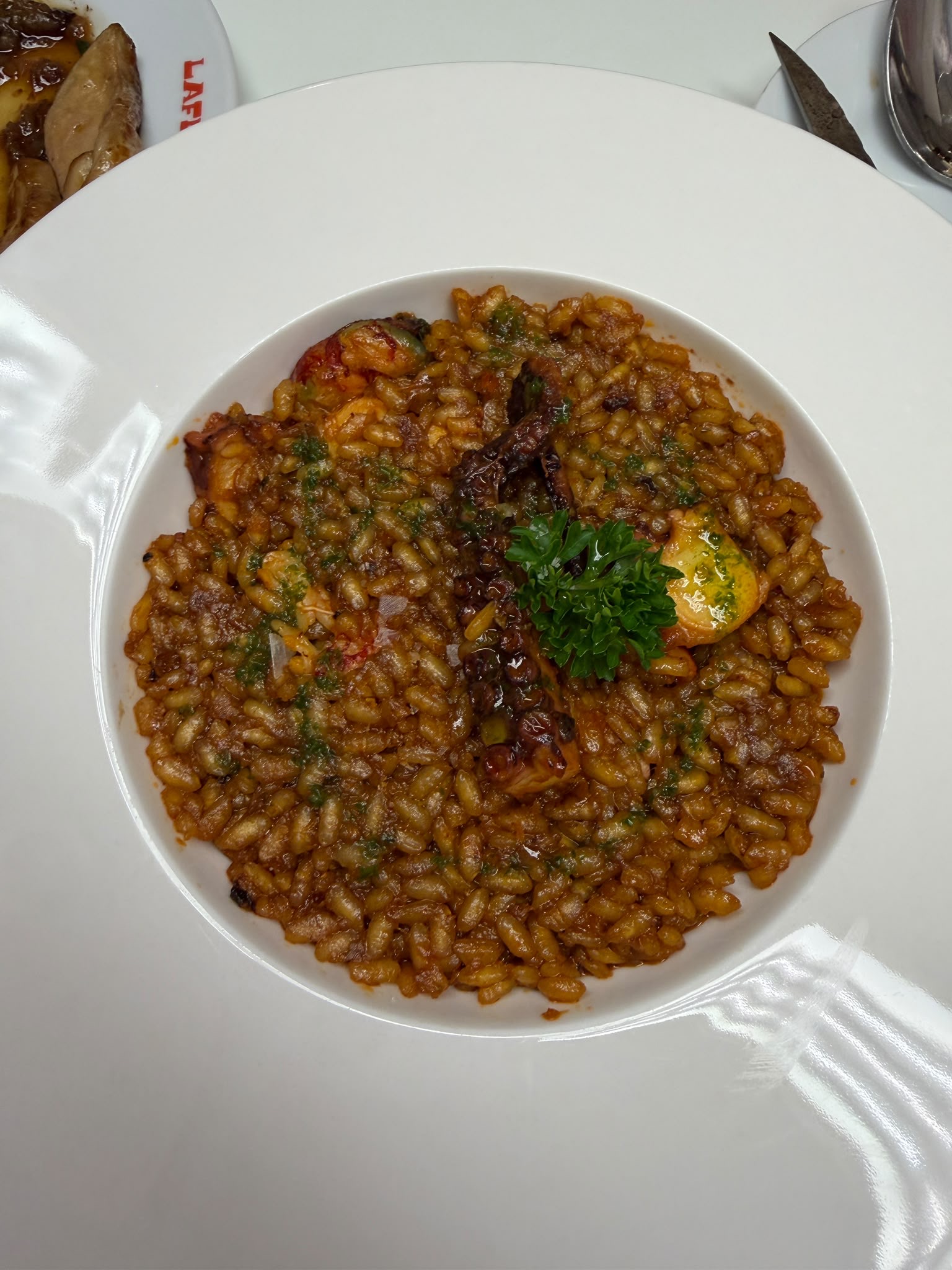 Seafood rice dish served at Bar Sociedad Laferia